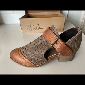 Brand new, never worn Rebels booties with side cut out and buckle detail.